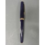 A blue Montblanc rollerball pen with original refill