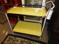 A 1960s two tiered drinks trolley,