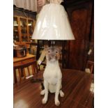 A pair of resin dog lamps,