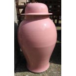 A pair of Chinese style, bulbous form, pink vases,