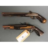 A near pair of vintage reproduction Flintlock Pistols with working trigger and hammer.