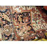 A large Persian Heriz carpet,