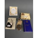 A collection of maritime items, to include silver napkin ring by Walker and Hall, compact, lighter,