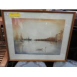 A framed signed lithograph of Venice ent