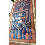 A Persian Khotam design rug, the all over geometric design on midnight blue ground,