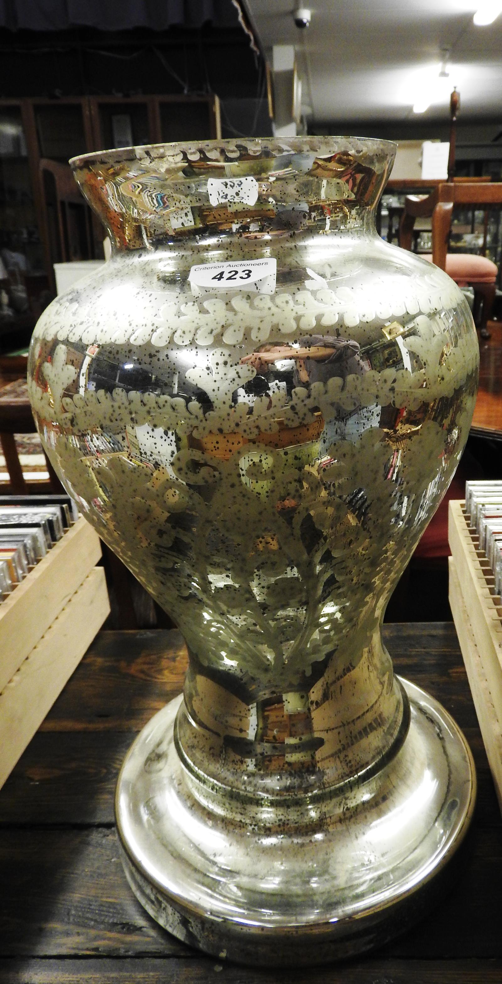 A silvered bulbous form vase H.