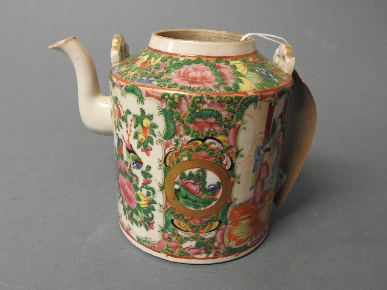 A Cantonese porcelain tea pot with figural detailing