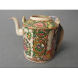 A Cantonese porcelain tea pot with figural detailing