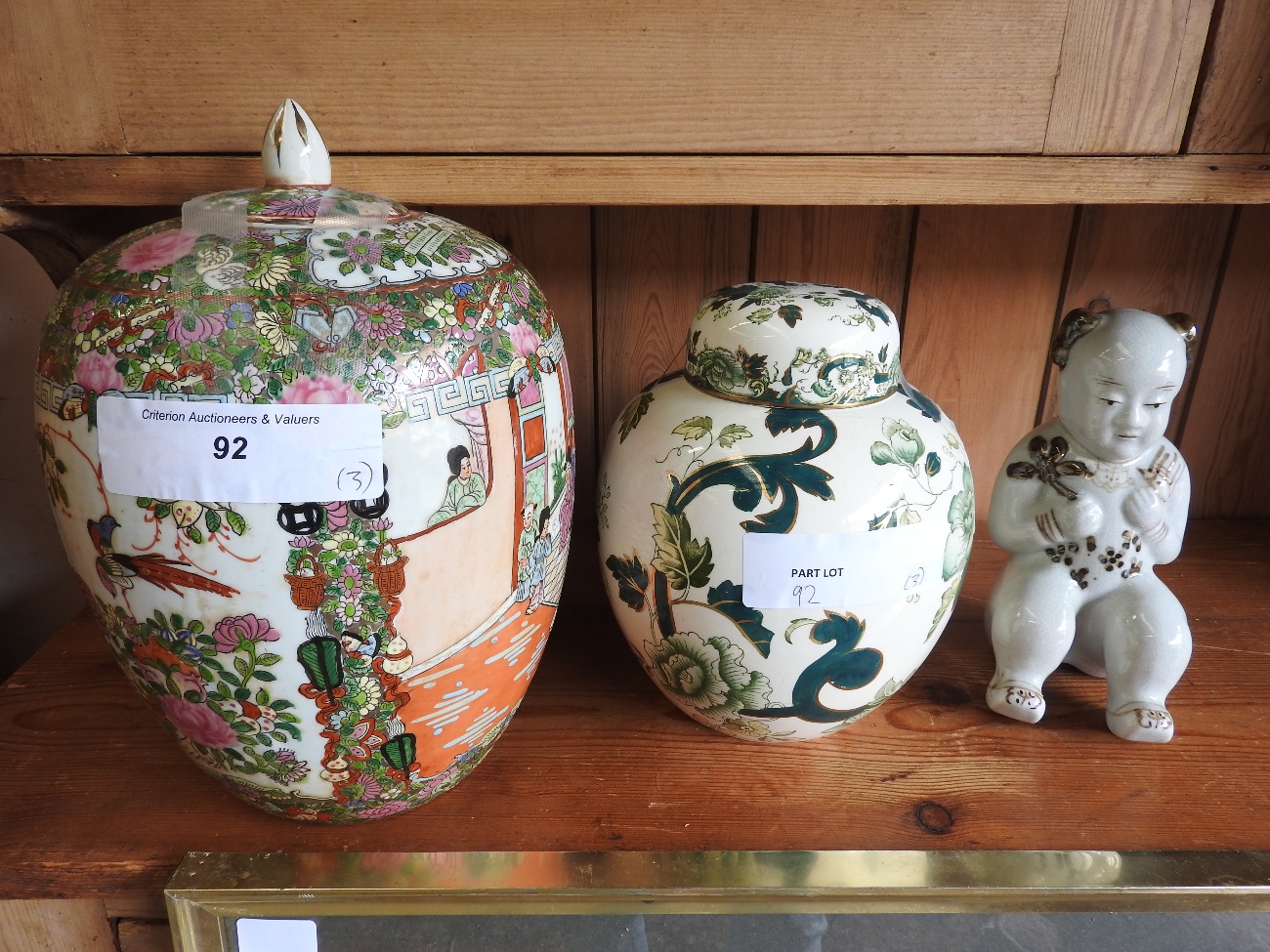 A collection of Oriental porcelain, to include a walnut lidded vase,