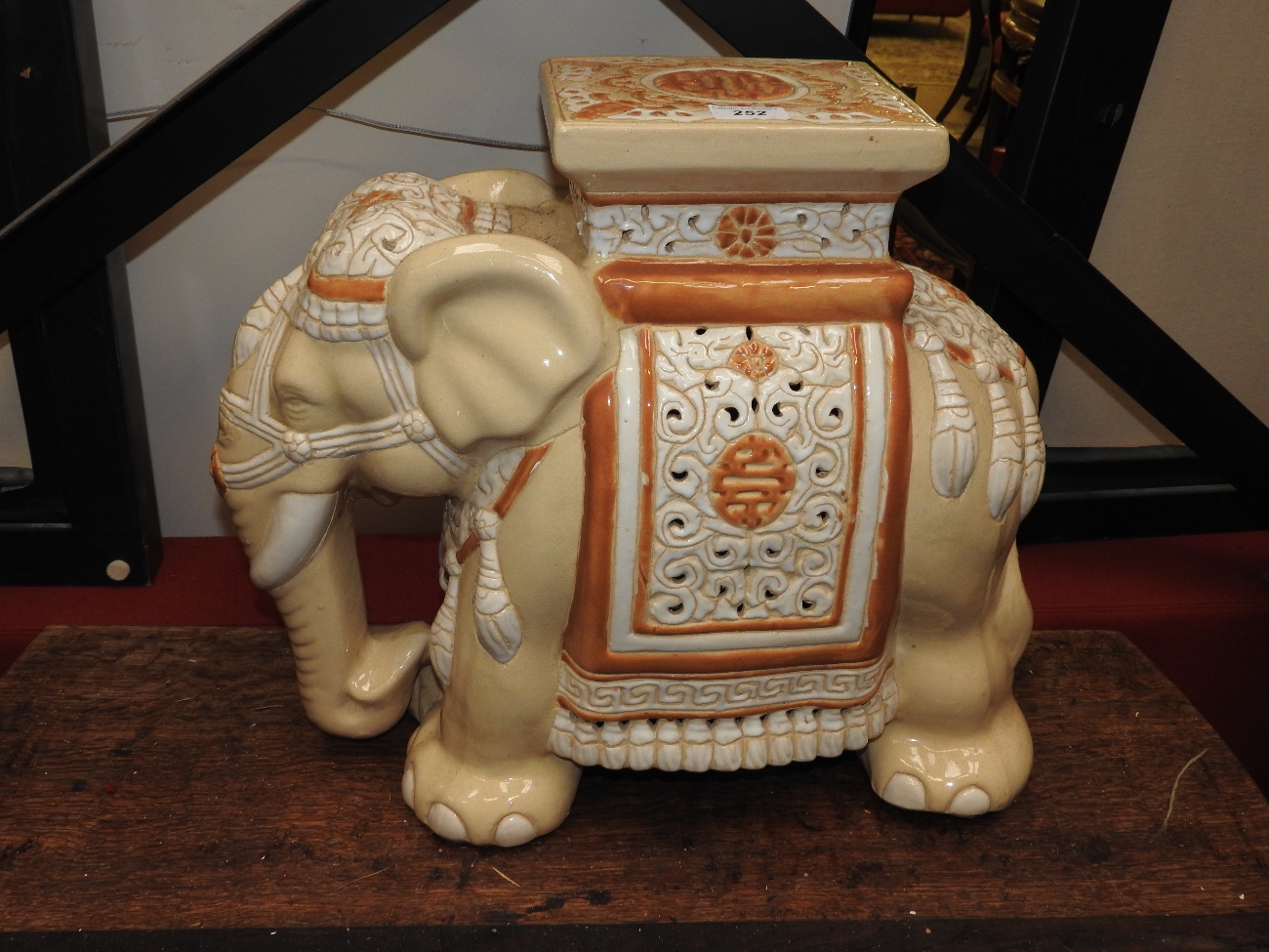 A porcelain garden seat in the form of an elephant