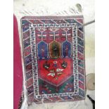 An Afghan rug of small porportions,