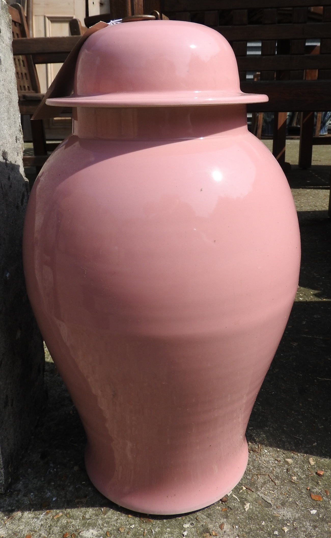 A pair of Chinese style, bulbous form, pink vases,