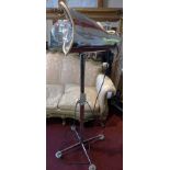 An unusual retro lamp with chromed finish, formerly a salon hairdryer,