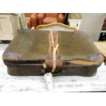 A distressed suitcase, a distressed leat