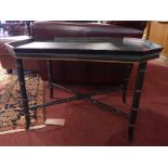 A black lacquered octagonal tray top low