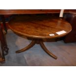 A Georgian oak low table the circular to