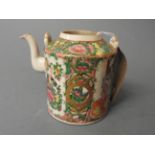 A Cantonese porcelain tea pot with figur