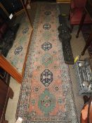 An antique Persian heriz design runner,