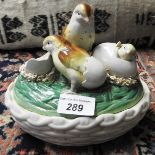 A porcelain trinket box with chicken and