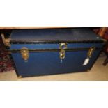 A large vintage travelling trunk,