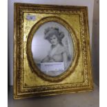 An 18th Century print of a lady in period gesso frame,