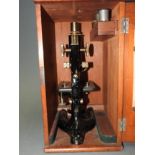 A cased vintage Prior of London microscope