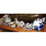 A large collection of blue and white ceramics to include Mason's sapphire gilded examples.