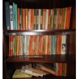 A large quantity of vintage Penguin paperback books and others