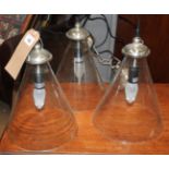 A set of six contemporary glass domed ceiling lights,