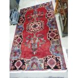 An extremely fine North West Persian josheghan carpet 347cm x 202cm,