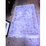 A Chinese part silk rug,