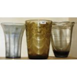 A collection of three glass vases,