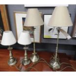 Two pairs of table lamps, largest; H. 59cm, smallest; H.37cm.