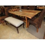 A contemporary designer elm trestle table,