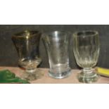 Three bohemian glass goblets of typical form,