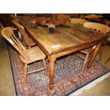 A pine country table with plank top and turned legs,