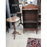 A mahogany dwarf open bookcase on cabriole aupports,