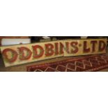 A vintage painted shop sign 'Oddbins' of large proportions