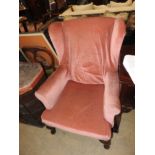 A pair of Queen Anne design wingback armchairs,