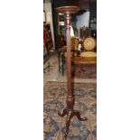 A 19th Century mahogany torchere,