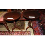 A pair of 20th Century reproduction wine tables