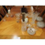A collection of glassware including decanters and bowls