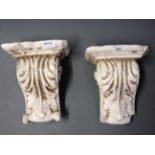 A pair of classical design plaster cobblers.