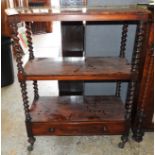 An early 19th Century William IV rosewood three tiered whatnut buffet,