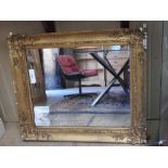 A 19th Century Georgian giltwood and gesso wall mirror,