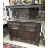 A Jacobean design carved oak side cabinet credenza ,