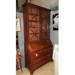 An early 19th Century George III mahogany Burean bookcase,