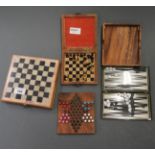 A 'Dunhill fragrances' travelling backgammon set, a wooden travelling and marble chess set,