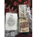 A pack of early Victorian playing cards, another later set of cards both by De La Rue,