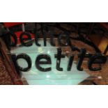 A pair of lucite models having black lettering 'Petite' (2)